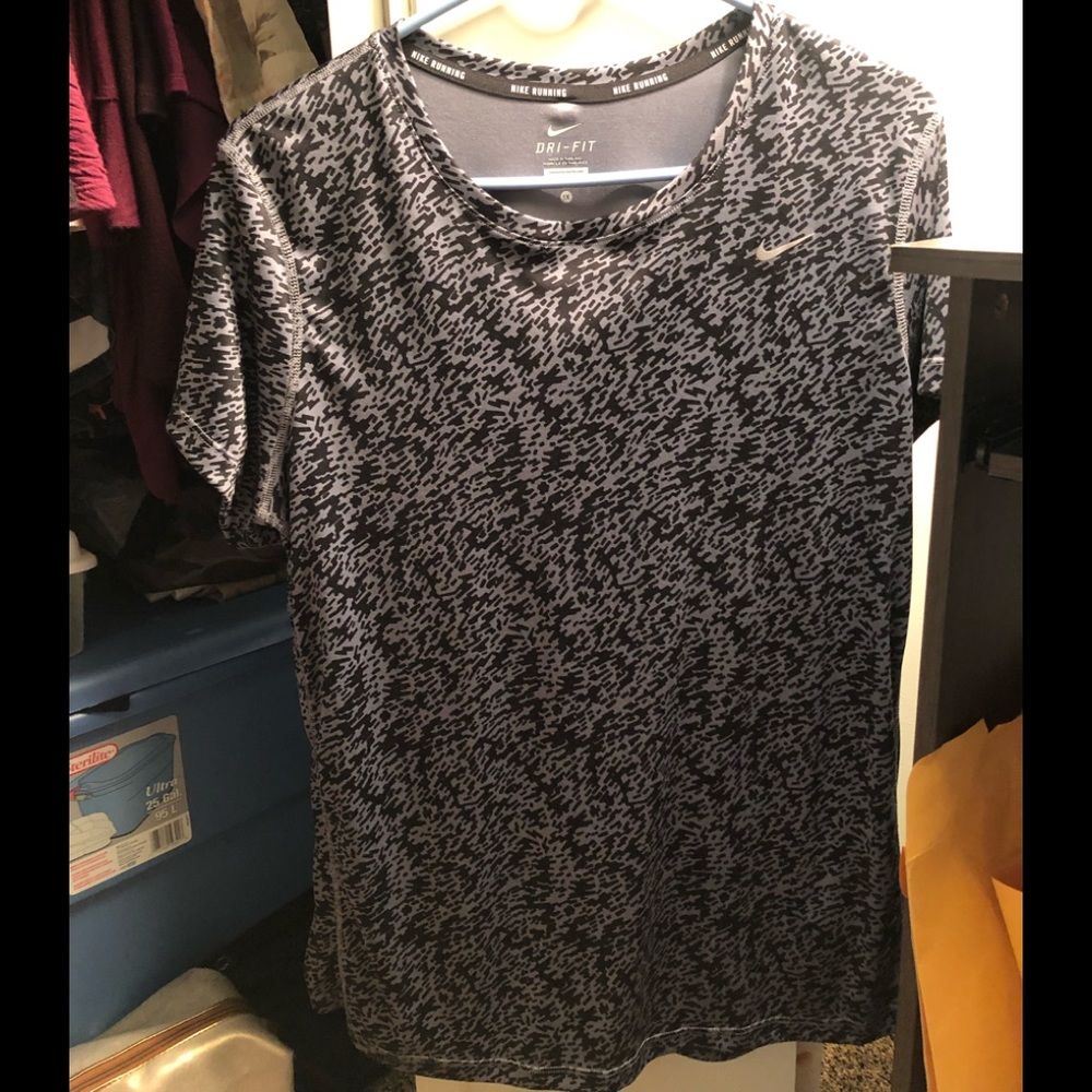 Women’s dry fit Nike t shirt black and silver 1X fits like XL brand new no tags
